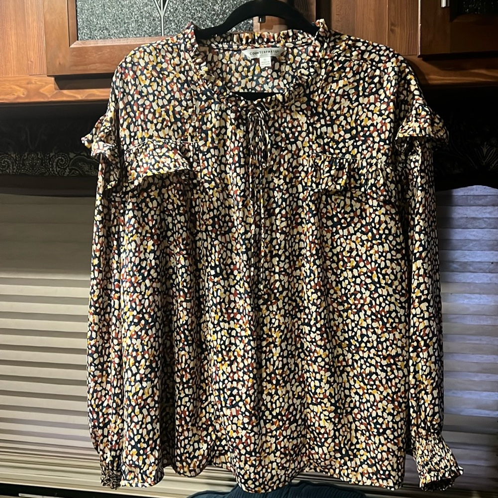 Multicolor long sleeve blouse. Cream, rust, mustard and teal colors.